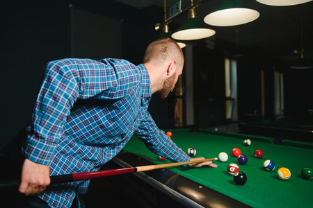 Playing billiard - Close-up shot of a man playing billiard