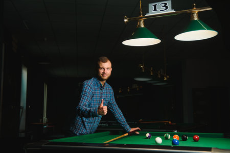 Playing billiard - Close-up shot of a man playing billiard