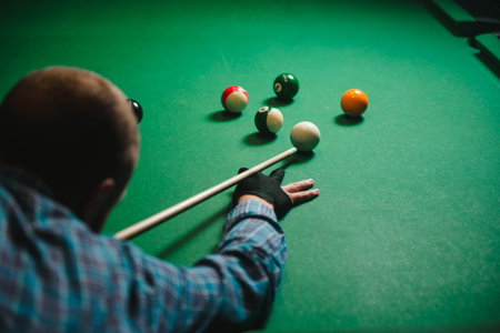 Playing billiard - Close-up shot of a man playing billiard