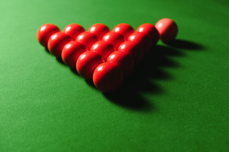 Snooker balls on the table in the pub at night.