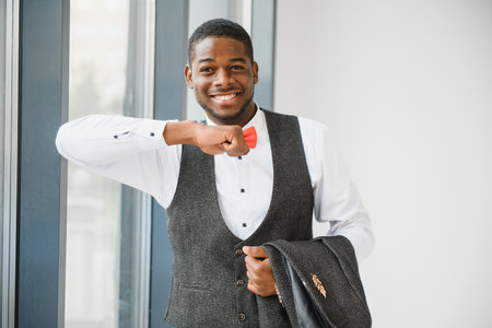 Close up portrait of attractive confident African American businessman.の写真素材