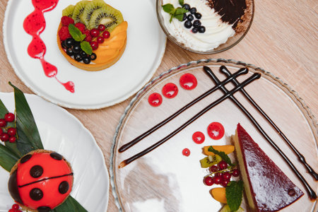 different desserts on the table in a cafeの写真素材