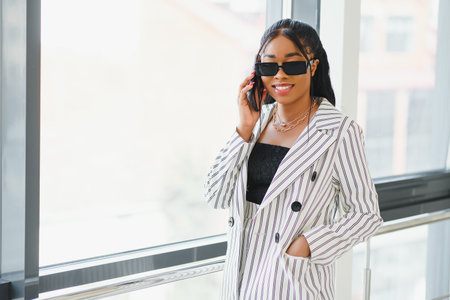 african american business woman in sunglasses