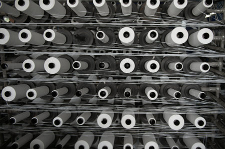 Production of polypropylene yarn for making bags.