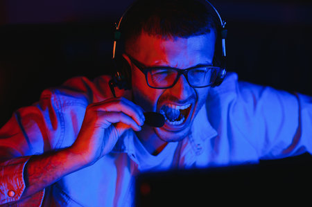 Gamer playing a first person shooter on high end pc.