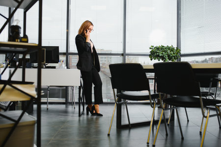Portrait of modern business woman in officeの写真素材