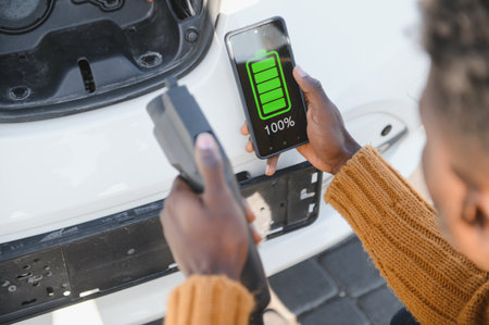 Phone charging in car concept, close up image of smart phone charger in car dashboardの写真素材