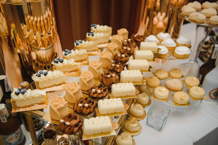 various desserts with fresh fruit on buffet line, sweetの写真素材