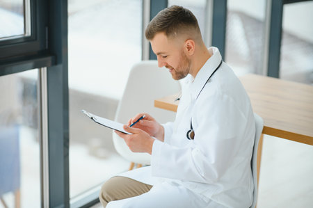 Portrait of an handsome young doctor.の写真素材