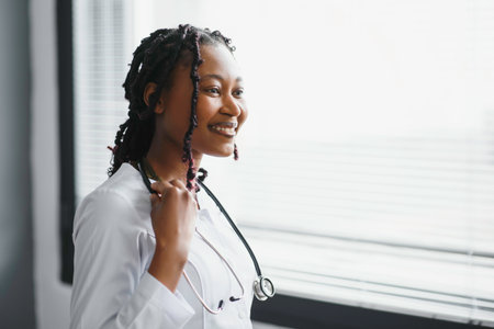 beautiful african nurse in hospital