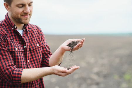 Soil in farmer arms. image with selective focusの写真素材