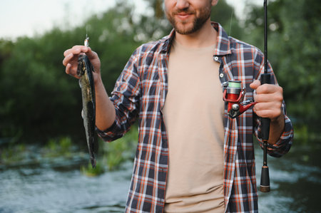 Male hobby. Ready for fishing. Relax in natural environment. Trout bait. Bearded elegant man. Man relaxing nature background. strategy. Hobby sport activity. Activity and hobby. Catching and fishing.の写真素材