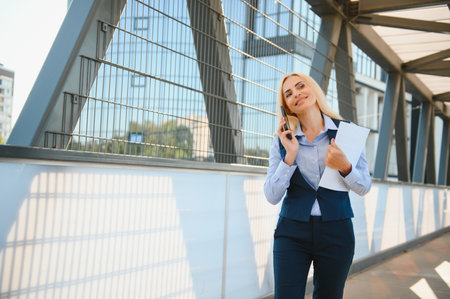 Portrait of business woman smiling outdoor.の写真素材