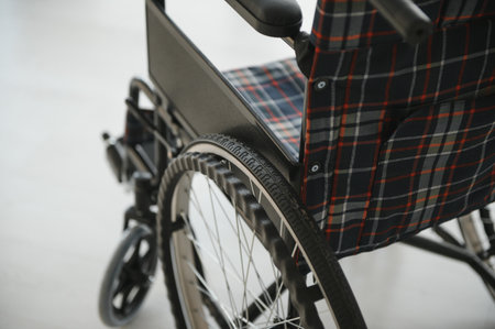 Empty wheelchair in the living room. Lonely and healthcare concept