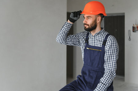 Builder handyman with construction tools. house renovation backgroundの写真素材
