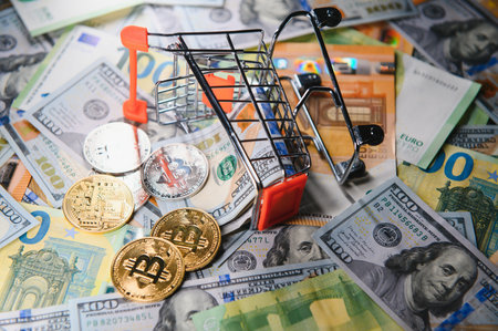 euro banknotes and coins, dollar banknotes with bitcoin. high quality photoの写真素材