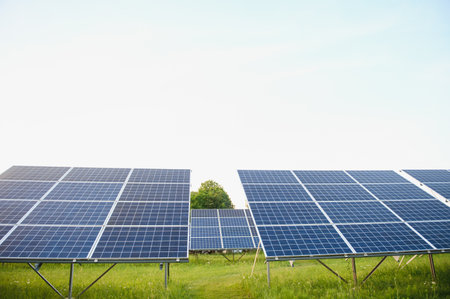 Solar panels energy farm on sky backgroundの写真素材