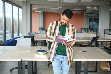 Handsome and young indian male college student