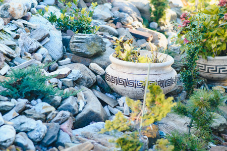 Backyard Garden Modern Design Landscaping. Landscaped Back Yard. Decorative Garden With Pathway Or Walkway From Stone And Rocks Or Gravel. Back Yard Or Park Lawn With Stony Natural landscapingの写真素材