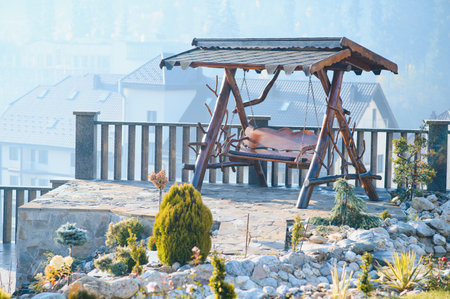 Backyard Garden Modern Design Landscaping. Landscaped Back Yard. Decorative Garden With Pathway Or Walkway From Stone And Rocks Or Gravel. Back Yard Or Park Lawn With Stony Natural landscapingの写真素材