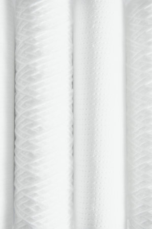 cartridges for water filter on white.