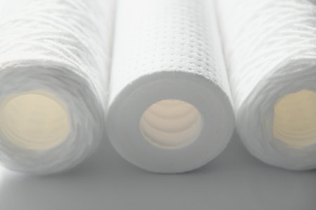 cartridges for water filter on white.の写真素材
