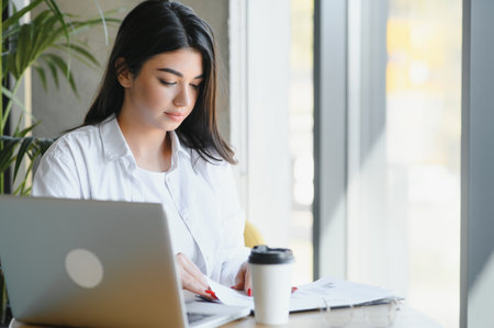 Smiling girl student study online with skype teacher, happy young woman learn language listen...