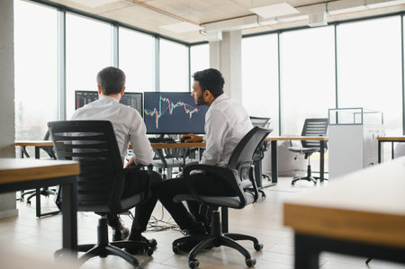 Two diverse crypto traders brokers stock exchange market investors discussing trading charts...