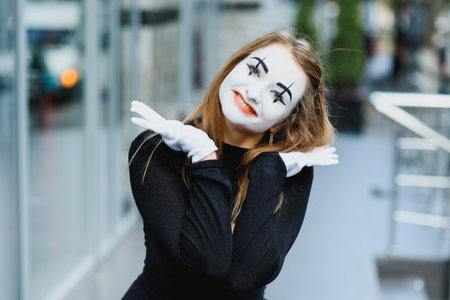 The girl with makeup of the mime. improvisation.の写真素材