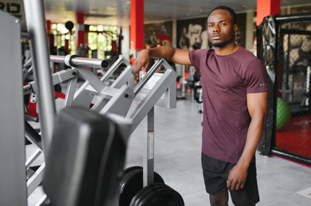 healthy african american man resting after workout.