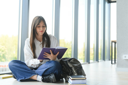 Young student girl in university.の写真素材