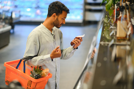 Man at grocery store products.の写真素材