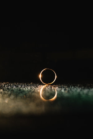 Beautiful wedding rings on light background