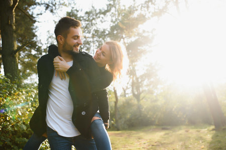 Happy young couple in love at the park