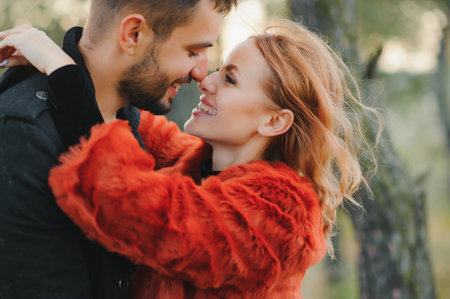 Happy young couple in love at the park.の写真素材