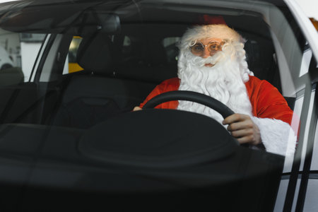 Portrait of Santa Claus. Santa Claus is driving his carの写真素材