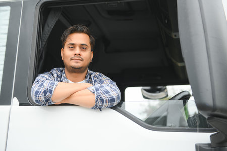 Portrait of an Indian truck driver.の写真素材