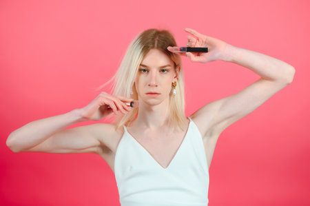 transgender posing isolated in studio. portrait of male model wearing make-up