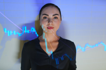 successful stocks and forex market trading - young beautiful and happy business woman and trader coaching investment strategies and financial success on candlesticks graph.の写真素材