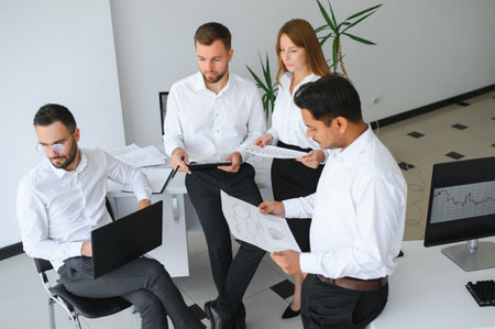 Business team working on their business project together at office