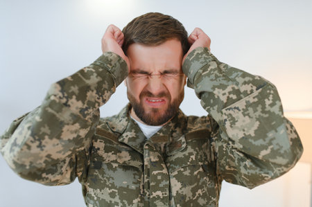 Portrait of middle aged sad, desperate military man. PTSD concept. horizontal shot.の写真素材