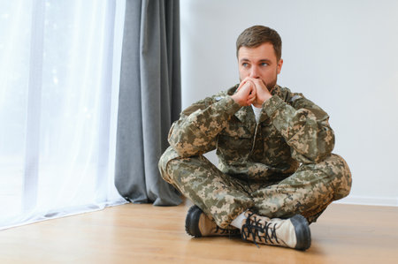 Portrait of middle aged sad, desperate military man. PTSD concept. horizontal shot.
