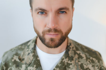 Portrait of middle aged sad, desperate military man. PTSD concept. horizontal shot.の写真素材