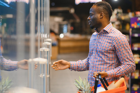 African American Man shopping in a supermarket.の写真素材