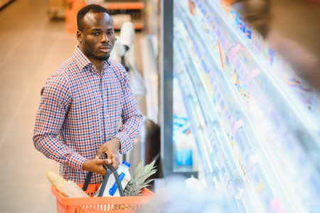 African American Man shopping in a supermarket.の写真素材