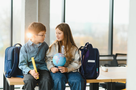 Photo of two small girl boy schoolchildren.の写真素材