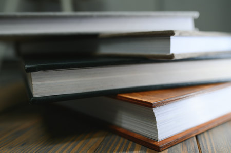 photobooks stacked on top of each other. the concept of making books and albums from photos. services of a professional photographer and printing house.の写真素材