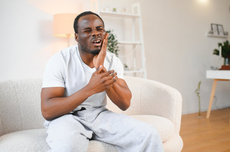 African American With Sore Tooth Decay. Dental Oral Health.の写真素材