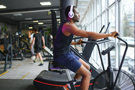 healthy men on gym bike.