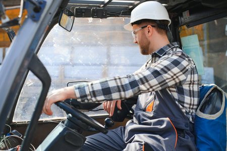 A man on a forklift works in a large warehouse, unloads bags of raw materials.